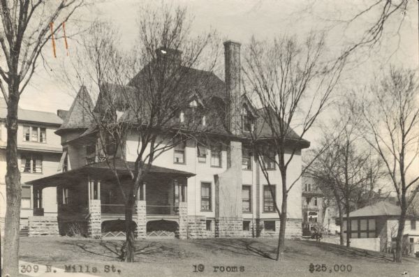 Exterior view of house located at 309 North Mills Street, built in 1887 and remodeled in 1905 by architects Claude and Starck for J. William Conklin; it was known as the Conklin House. The house was split in half and moved to 510 East Mifflin Street in 2008.