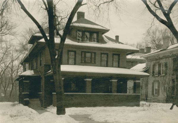 This American Foursquare house, 416 N. Carroll Street, owned by Frank M Wootton, president of the Madison Motor Car Company, was built in 1914. Stanley Hanks, a realtor, had it listed for sale for $40,000 sometime in the 1920s.