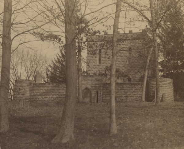 View looking across lawn towards the Benjamin Walker Castle, 1862-1893, in the 900 block of East Gorham Street.