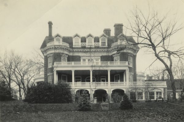 View across lawn towards the front of the house at 530 N. Pinckney Street, which was built by Magnus Swenson. By 1922 it was occupied by the Delta Kappa Epsilon fraternity.