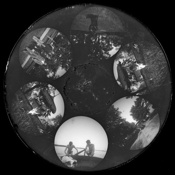 Six circular images on a glass plate negative from the Stirn Concealed Vest Camera. One of the images is of a black dog standing on its hind legs; another is of three smiling young men wearing suits and hats; a horse-drawn streetcar is next; then two nude young men climbing from the lake into a boat (probably Lucien S. and James Hanks, Stanley's twins); and, finally, two similar images of a white statue in front of a pagoda-style summer house near the shore.
