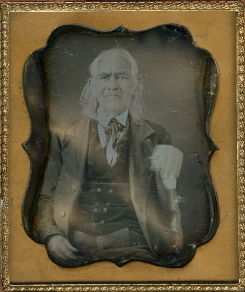 Sixth plate daguerreotype. Waist-up portrait of Samuel Donalson, 1767-1860, around the age of 90, sitting and holding a cane. Mr. Donalson was an early settler in Ohio and a colleague of Simon Kenton. Donalson was elected to the Ohio Constitutional Convention of 1802.