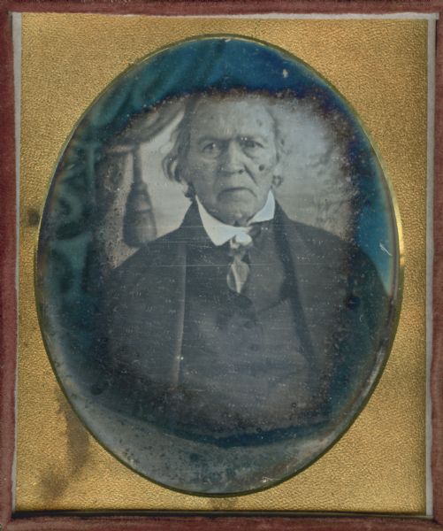 Sixth plate daguerreotype. Waist-up portrait in front of a painted backdrop of Captain James Ward. Ward was from Mason County, Kentucky, and a compatriot of General Simon Kenton.