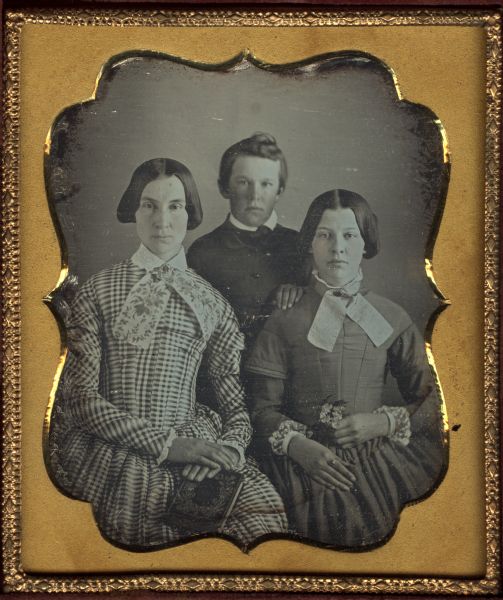Sixth plate daguerreotype of Betsy H. Smith, left, with her daughter, Laura, right,and son, George. The three are the mother, sister and brother of Rosellah Bowman, resident of Madison.
