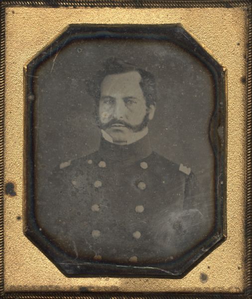 Sixth plate daguerreotype waist-up portrait of Captain William H. Chapman, a regular army officer who served in the Mexican War and the Civil War. After retiring, Chapman settled in Green Bay, his wife's home. Chapman met his wife while posted at Fort Howard between 1833 and 1838. In this portrait he is wearing a Mexican War-era uniform.
