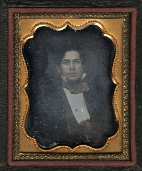 An eighth plate daguerreotype of Edward P. Bridgman, 1834-1915, as a young man. Bridgman served in the 37th Massachusetts volunteer Infantry, Company G in the Civil War. He came to Wisconsin in 1875, resided at Keshena on the Menominee reservation until 1875, homesteaded in Langlade County 1879-1882, resided in Antigo from 1882-1901 and in Madison from 1901-1915. He is the father of Louis Bridgman of Madison. The portrait is a front facing, bust figure.