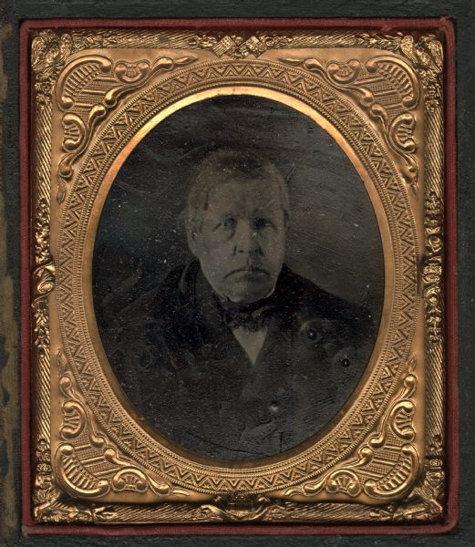 Sixth plate ferrotype/tintype of Dr. Chauncey Williams, of Lafayette, Onondaga County, New York. Father of Henry C. Williams, and grandfather of N.M. Brown. Quarter length, facing front, dressed in coat and tie. 