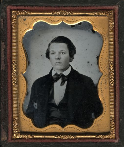 Ninth plate ambrotype of Martin Stoddard at age 17. Half figure facing front and slightly left, wearing coat, vest, and tie. 