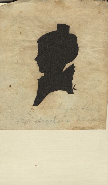 Hollow-cut silhouette, facing left (proper right), of Angeline Campbell Clark (Mrs. Ben Clark). Born at Hamer, NY, married Benjamin Clark in 1841. Born 1819, died 1847 at age 28.