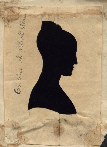 Aperture type hollow-cut silhouette of Caroline A. Allcott Stone, sister-in-law of Dr. Increase A. Lapham. Subject faces right (proper left), and wears her hair swept up. 