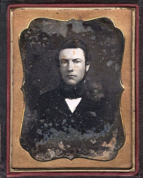 Quarter plate daguerreotype of William Beers, facing foward, wearing dark suit and tie, and chin whiskers. 
