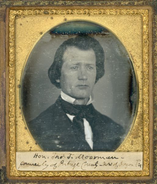 Sixth plate daguerreotype of Thomas J. Moorman. Quarter-length portrait, facing front and slightly left. He is wearing a suit coat, tie, and stand collar. 