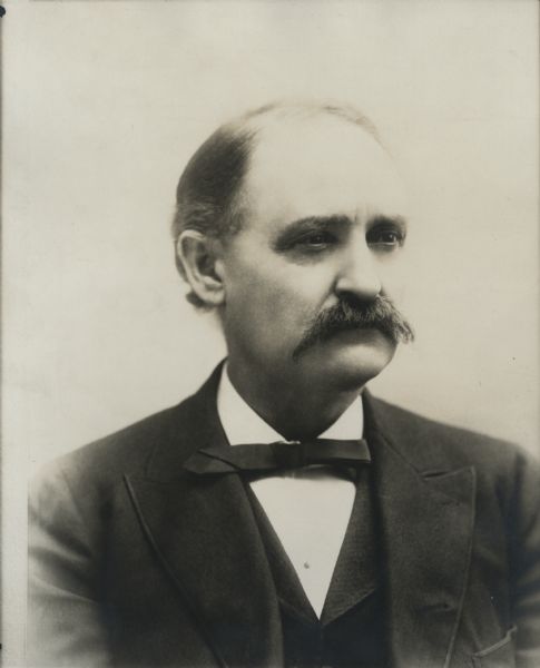 Quarter-length studio portrait of Gilbert M. Woodward. Woodward served as Democratic member of the House of Representatives from 1883 to 1885 for the seventh congressional district of the State of Wisconsin.