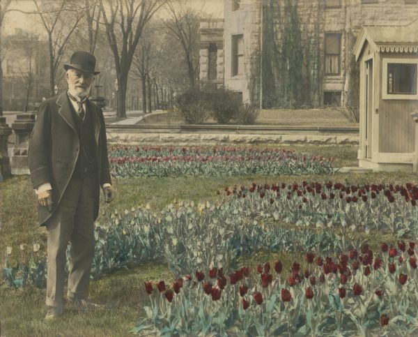 Frederick Layton gave this hand-colored photograph of himself in his garden on Marshall Street to his niece Elizabeth Layton Fowle on August 8, 1914. He died in 1919.