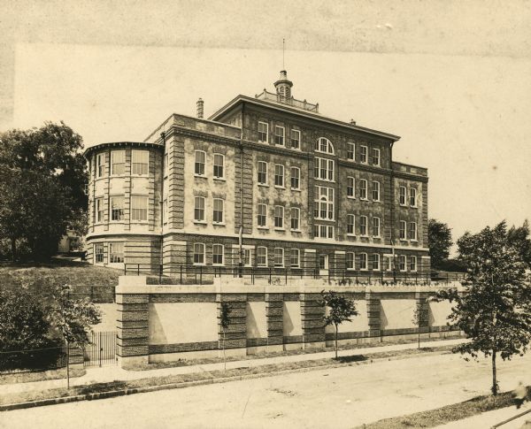 View across street towards the Layton Home for Incurables (also called Layton Home for Invalids). The home was suggested by Frederick Layton's wife, Elizabeth Hayman Layton. It was built in 1908 on the grounds of the Milwaukee Hospital and endowed by the Laytons.