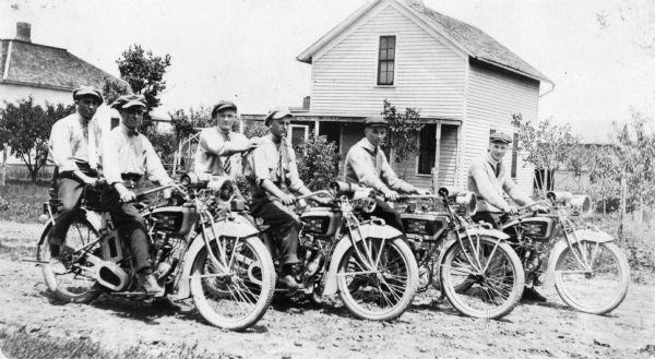 Excelsior Twin Motorcycles with, left to right: Stroh Brothers, Mart Liedtke, William Martin, Mr. Schultz, and Mr. Liedtke.