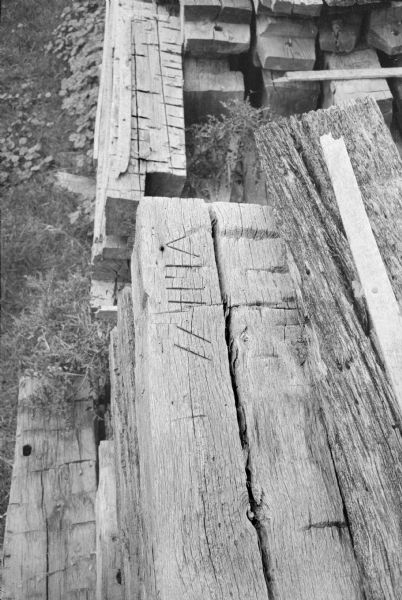 Original timber construction marks on the first historic structure to be reconstructed at Old World Wisconsin, a Wisconsin Historical Society site.