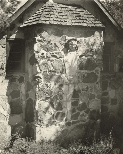 The figure of Christ, in stone, on the wall of a private chapel on the west side of Bugh's Lake.
