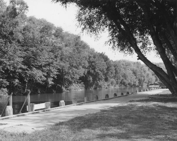 Calumet Harbor in Columbia County Park, best known for its boating facilities. In the foreground are the docking facilities, with one boat tied up in the distance on the right.