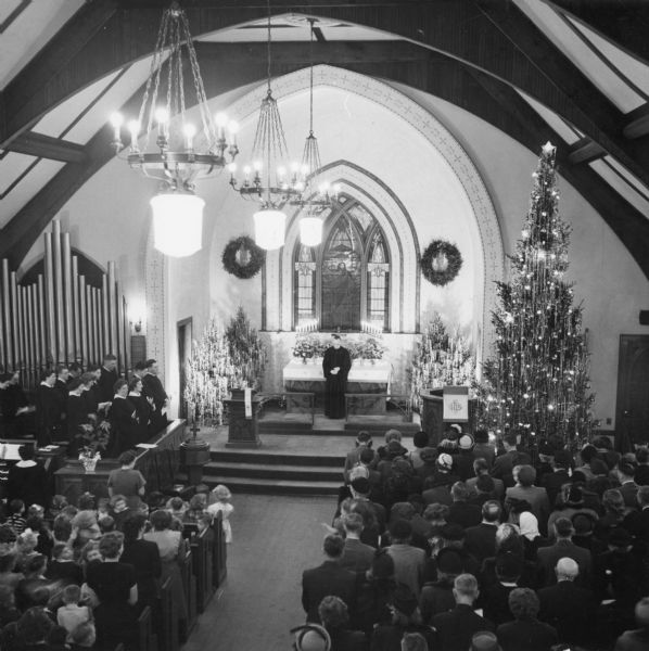 Elevated view of a church service held on Christmas Eve.