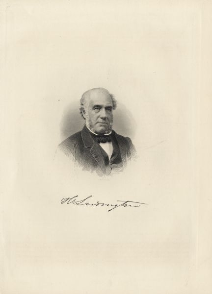 Quarter-length vignetted portrait of Harrison Ludington. He has muttonchops, and is wearing a suit, necktie and high collar.