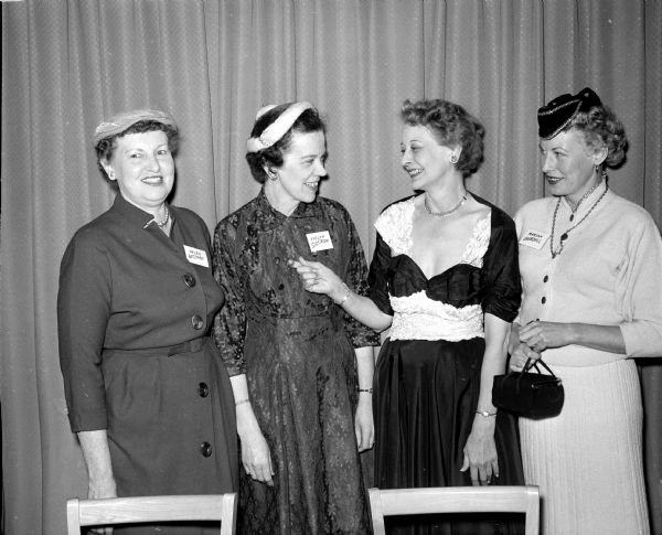 Members of the Four Lakes Secretaries Association hold their annual membership party in the Matador Room at the Spanish Cafe. Four of the officers are, left to right, Helen Gutzman, treasurer; Evelyn Sjostrom, recording secretary; Florence Bratlie, president; and Marian Churchill, vice-president.