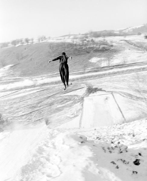 Bob Narowetz takes off from the top of the jump scaffold at the annual Blackhawk Ski Club jumping tournament at their Tomahawk Ridge site.