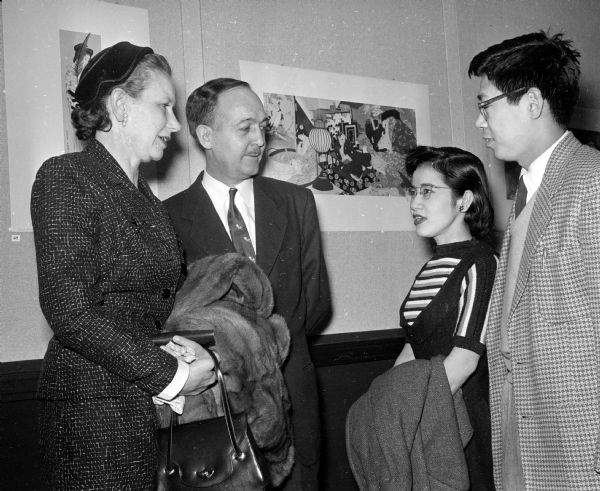 Dorothy and D. Murray Angevine (left); and Mrs. and Mr. Masako Yamada attending the opening of an exhibition of Japanese prints at the U.W. Memorial Library gallery.