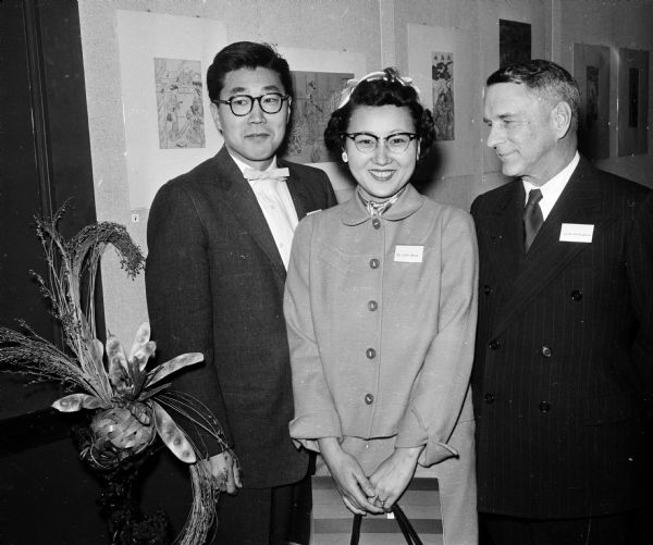 At the opening of an exhibition of Japanese prints at the U.W. Memorial Library are, left to right, Kishio Matoba, art teacher at Central High School and main speaker at the event; his wife, Chiyeko Matoba; and Justice Timothy Brown of the Wisconsin Supreme Court.