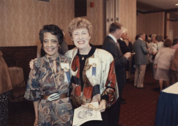 Vel Phillips and an unidentified woman. They are attending the NDHS reunion at the Pfister Hotel.
