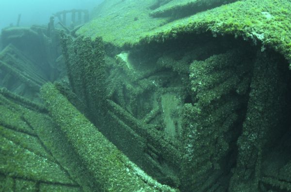 Underwater view of the wreck of the rail car ferry <i>Milwaukee</i> and part of its last cargo, bathtubs.
