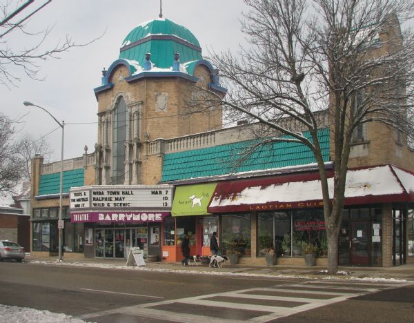The snow-dusted Barrymore Theater, formerly the Eastwood Theater, at 2090 Atwood Avenue. Businesses next to the theater include Bad Dog Frida and Lao Laan Xang.