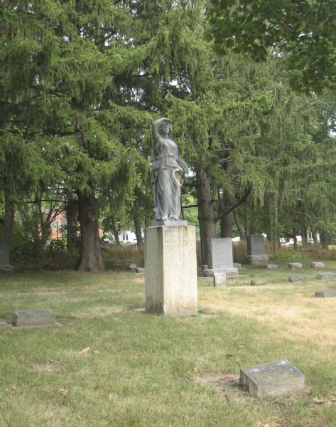 A memorial monument at the grave of Mary McFarland in the McFarland Cemetery.