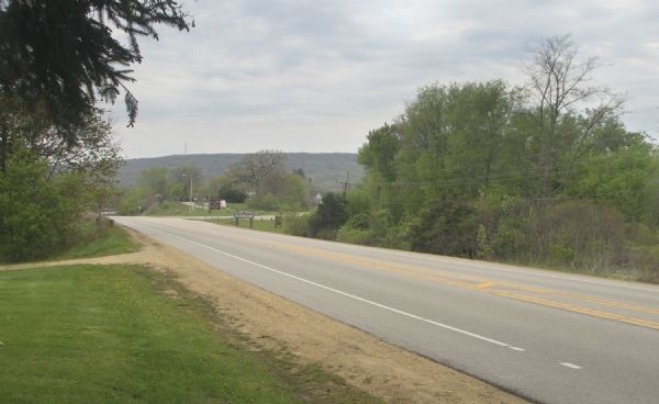 A view of the approach to the Village of Blue Mounds from the cemetery.