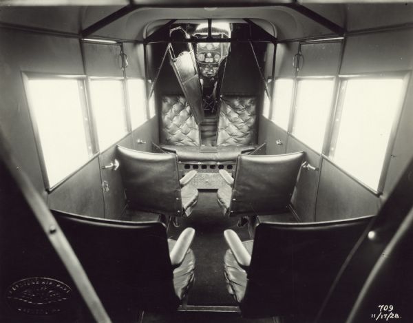 Interior view looking towards the cockpit of a 1928 Keystone-Loening Air Yacht. There are six passenger seats, and the cockpit seats two.