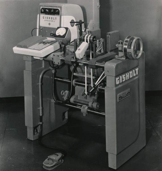 Dynetric machine, with foot pedal, manufactured by Gisholt Machine Company.