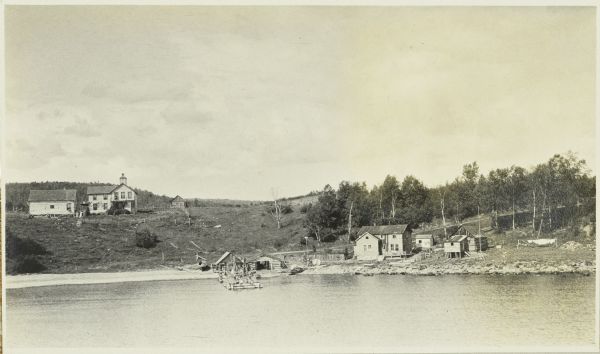 A view from Beaver Bay in Lake Superior of houses on the shoreline.