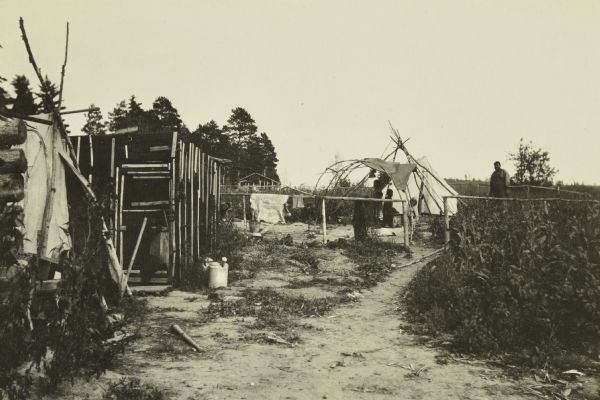A view of an Indian settlement on Moose River near Namakan Lake.