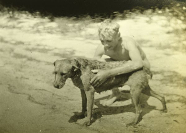 Carl Greene hugging his dog Di (Diadem).
