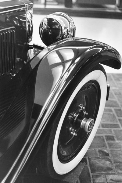 The fender and tire of a 1926 Packard Model 443, owned by Tom Shaughnessy, on display at West Towne Mall.