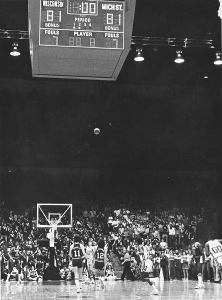 Wes Matthews Sr. game-winning, half-court shot to beat Magic Johnson's Michigan State Spartans at the University of Wisconsin Field House.