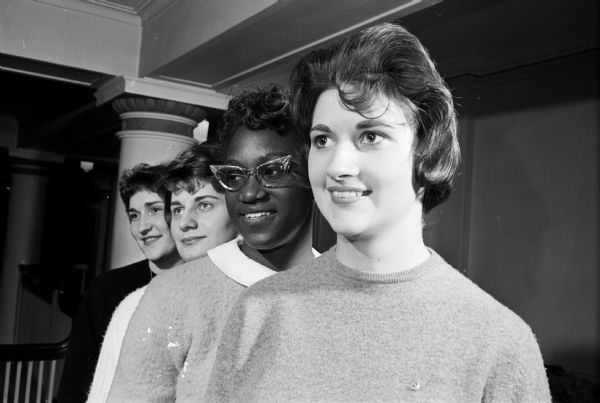 A group portrait of the officers of the YWCA Residence Girls Council includes, left to right: Mary Jo Boehmer, Prairie du Sac, treasurer; Willadene Netz, Independence, Missouri, secretary; Linda Beadles, Racine, vice-president; and Joyce Sipple.