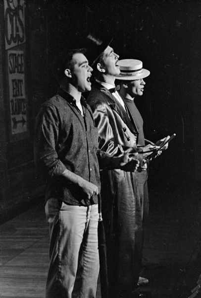 The University of Wisconsin Haresfoot Club Show returns to Madison from a six-day tour with its 1961 production, "Wonderful Show No.2." Haresfoot features in its all-male cast a 'kick' chorus of ersatz chorus girls. Steve Meckenroth, Harry Snyder, and Richard Robinson appear as such diverse characters as a movie director, ballet dancer, gangsters, a treasury agent, and senate investigators.