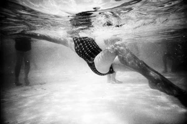 Underwater photograph of a youth learning to swim in a Sun Prairie pool.