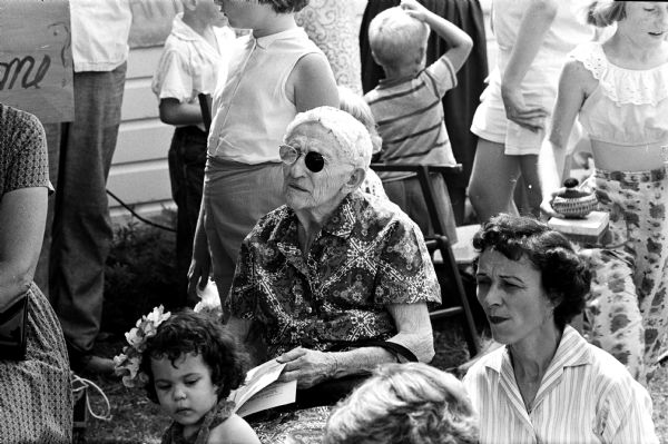 Not just children came to the Sunset Hills neighborhood children's circus. It was a fund raiser to benefit the American Nursing Research Foundation. The portrait of an elderly woman seated to watch the show, which was held in the backyard of Frank and Muriel Wagner, 229 N. Hillside Terrace.
