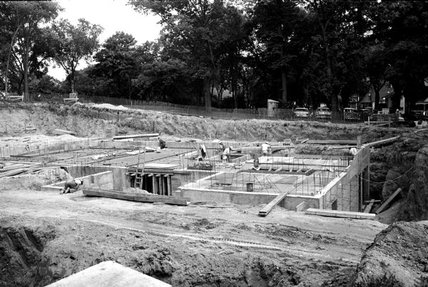The foundations of a new home for the Christ Presbyterian Church rise at N. Brearly and E. Gorham Streets. The new church will replace the church currently located at 124 Wisconsin Avenue.