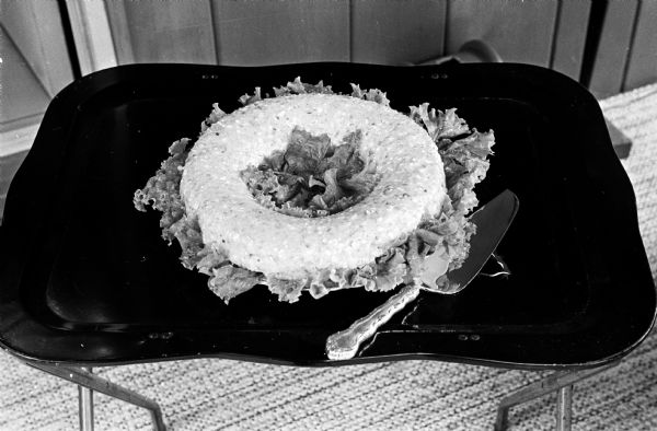 This Horseradish Salad won second place in the salad category of the Wisconsin State Journal Cookbook Contest. The recipe was submitted by Mrs. John J. Anderegg, Monroe, Wisconsin.