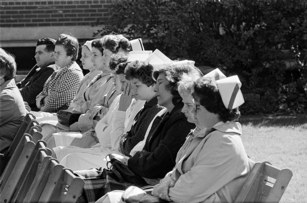 Members of St. Mary's hospital nursing staff watch as techniques to be used during emergencies are demonstrated during a two-day instructional program at the hospital.