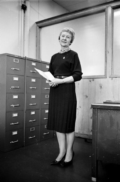 Certified professional secretary Mary Rubado, who is a personnel assistant at the Wisconsin State Headquarters of the Selective Service System.