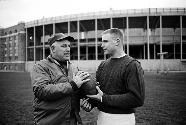 University of Wisconsin football coach Milt Bruhn standing with his son Peter, a sophomore, before Parents' Day.